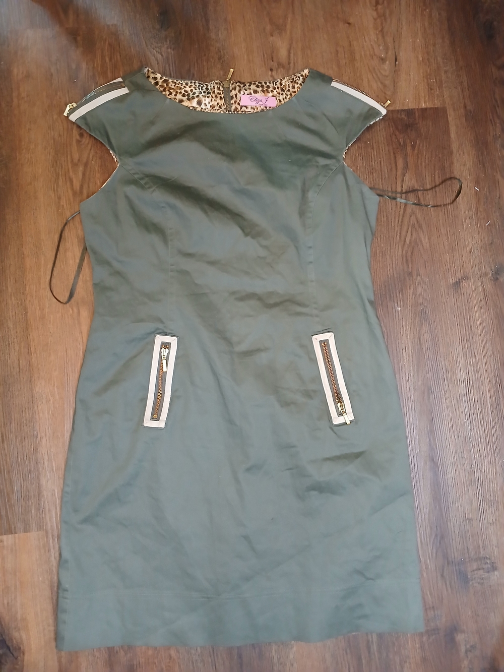 Eliza J olive green shift dress featuring a cheetah print lining and gold zipper